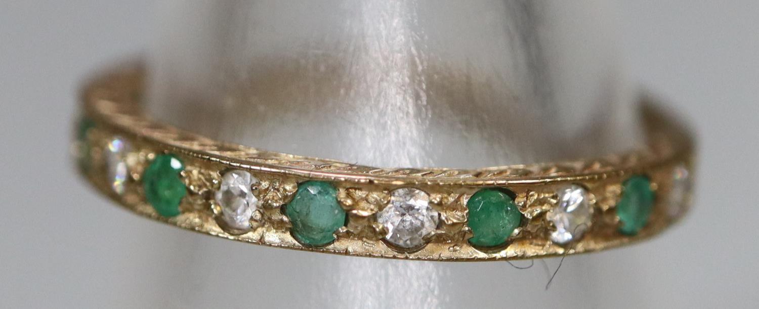 A 9ct gold half eternity style ring set with green and white stones. Ring size N. Approx weight 1. - Image 3 of 4