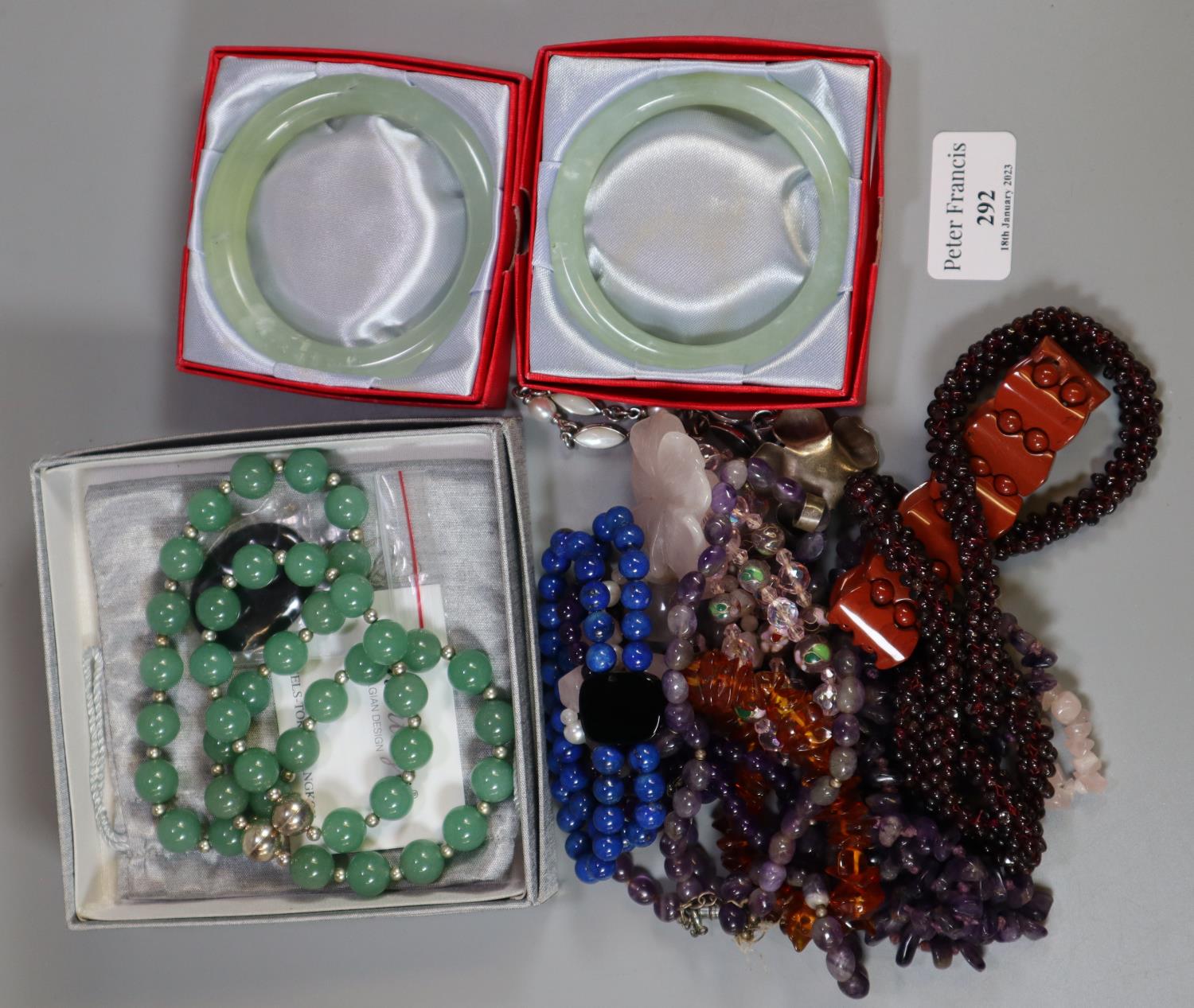 Bag containing assorted bangles, beaded necklaces, gemstone beads etc. (B.P. 21% + VAT)