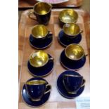 Tray of dark blue and gilt coffee ware to include: coffee cups and saucers, milk jug and sucrier,