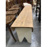 Rustic pine bench with shaped trestle ends. Length 153cm approx. (B.P. 21% + VAT)