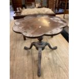 18th century mahogany tripod side/wine table having dish and shaped top on tripod legs and hoof