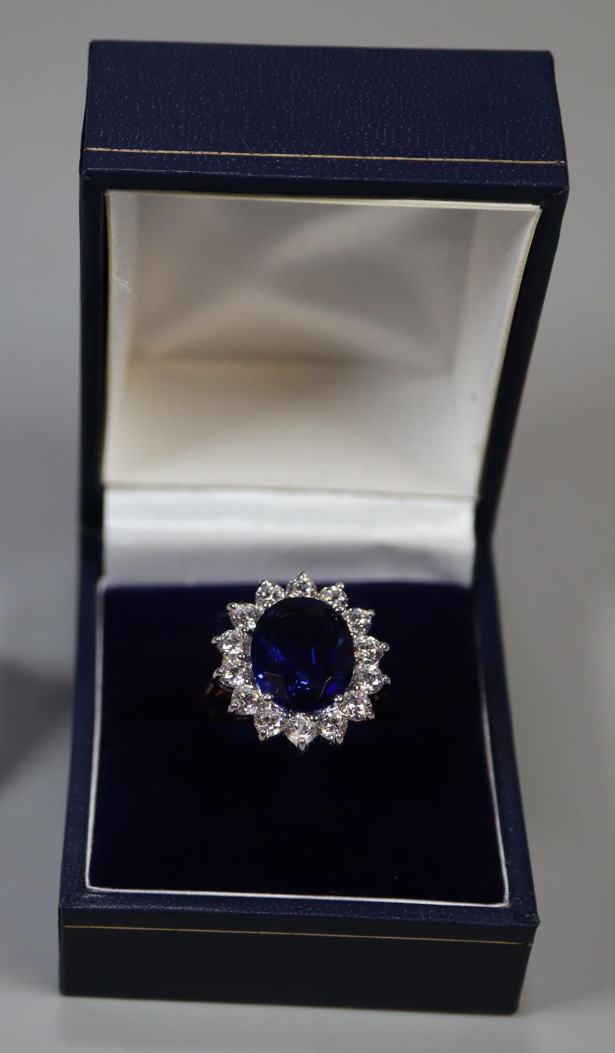 A synthetic sapphire and moissanite ring set in gold plated silver. (B.P. 21% + VAT)