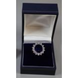 A synthetic sapphire and moissanite ring set in gold plated silver. (B.P. 21% + VAT)