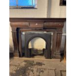 Edwardian mahogany architectural fire surround with associated cast iron grate. (B.P. 21% + VAT)