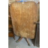 19th century mahogany tilt top breakfast table on quatrefoil base, brass paws and castors. (B.P. 21%