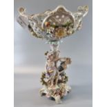 Early 20th century German porcelain figural centre bowl decorated with encrusted flowers, foliage