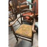 Early 20th century oak high ladder back open armchair with upholstered seat on turned supports. (B.