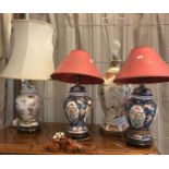 Pair of Oriental design porcelain floral baluster table lamps together with two other Oriental taste