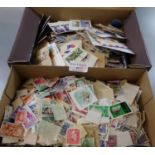 Shoe box of all world stamps off paper plus a further shoebox of on paper tamps.