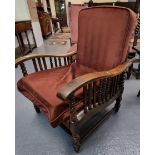 1930s oak reclining armchair with bobbin turned supports. (B.P. 21% + VAT)