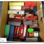 Box of playworn vintage diecast and other vehicles to include: Dinky Toys 250 fire engine, Dinky