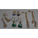 A pair of 15ct gold earrings and three pairs of 9ct gold earrings. Approx weight in total 9.5 grams.
