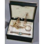 A commemorative 1902 brooch, a 9ct gold stone set brooch, 9ct gold ring set with white stones