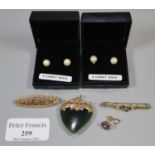 A Victorian heart shaped pendant, two 9ct gold brooches and two pairs of earrings. Approx weight