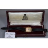 Omega gold plated lady's oval faced De Ville quartz wristwatch with leather strap. Lacks crown.