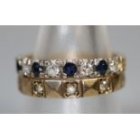 18ct gold sapphire and diamond ring and a 9ct gold white stone ring. Ring size of both M&1/2. Approx