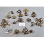 Small collection of British Military cap badges, to include: The Buffs, Fishguard Yeomanry (