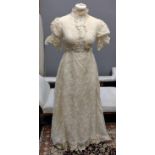 Vintage designer florally embroidered wedding dress (probably 1970's), with cap sleeves, high neck