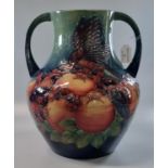 Large modern Moorcroft tube-lined two handled vase of baluster form, in the 'Finch and Berry'