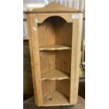 Small pine hanging corner cabinet with shaped shelves. (B.P. 21% + VAT)