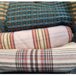Box containing three vintage woollen blankets or carthen; one is a Welsh tapestry orange and teal