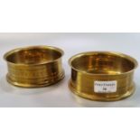 Pair of brass shell case candle stands formed from WWI 4.5 Howitzer brass shell cases, dated 1916,