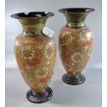 Pair of Doulton Lambeth Slaters patent floral decorated baluster shaped vases. Impressed marks to