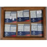 Framed collection of six Royal Male Registered for a Guaranteed Delivery' postage notes sent to 'Reg