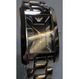 An Emporio Armani gents steel rectangular faced wristwatch appearing in un-used condition,