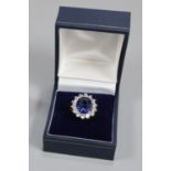 A synthetic sapphire and moissanite ring set in gold plated silver. (B.P. 21% + VAT)