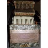 Two vintage piano accordions: a Tonella and a Pietro. (B.P. 21% + VAT)