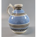Mid 19th Century Mocha ware single handled baluster jug. (B.P. 21% + VAT)