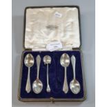 Cased set of four silver spoons with a matching salt spoon, one spoon missing (five in total). 2.1