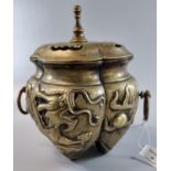 Chinese bronze lidded censer overall decorated with dragons and pearls having ring handles and