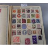 All world collection of stamps in Red the Royal Postage stamp album, with range of mint and used