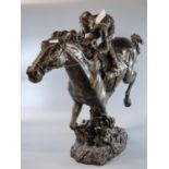 Modern bronzed hollow study of a horse and jockey on naturalistic base. 50cm high approx. (B.P.