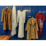 Collection of vintage clothing to include: light brown 3/4 length fur coat, a similar faux fur