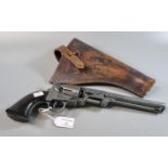 Diecast metal cinema prop type Colt revolver with wooden grips. Stamped '2 KA 98' in leather