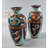 Pair of Japanese Meiji period cloisonné vases decorated with dragons, butterflies and flowers.