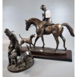 Bronzed figure group of huntsman on horse with hound on wooden base, together with another bronzed