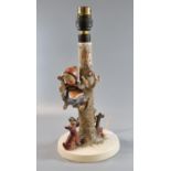 Hummel West German table lamp base in the form of a young girl sitting on a tree with terrier