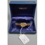 Tissot lady's gold plated wristwatch, appearing in original box, with original receipt. (B.P.
