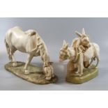Royal Dux porcelain group of two harnessed donkeys on a naturalistic base. Together with a Royal Dux