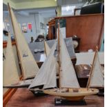 Two models of masted yachts, one marked '21 Skipper' with metal base. (2) (B.P. 21% + VAT)
