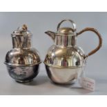 Two similar silver plated Jersey baluster jugs with wicker handles. (2) (B.P. 21% + VAT)