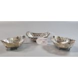 Pair of early 20th century silver pierced oval bonbon dishes on four feet, Birmingham hallmarks. 2.2