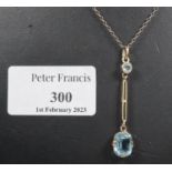 Edwardian 9ct blue stone pendant on a white metal chain. (B.P. 21% + VAT)