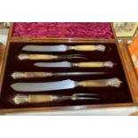 Late probably Victorian six piece oak cased carving set with horn handles and silver mounts. (B.P.