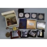 Box of oddments to include: various coins, silver car MG Club spoon, RAF cap badge, compact,