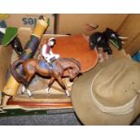 Box of mixed items: Australian military hat, Aboriginal shaker musical instrument, tan leather